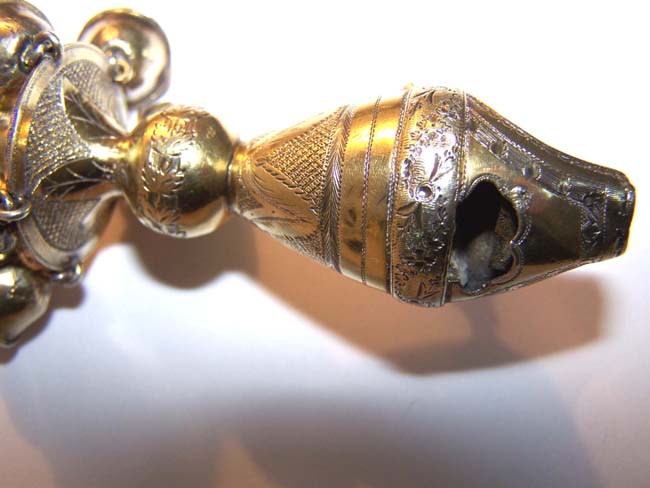 An early 19th century English Engraved Silver-Gilt Childs' Rattle, Whistle and Bells with Carved Coral Stem — image 2